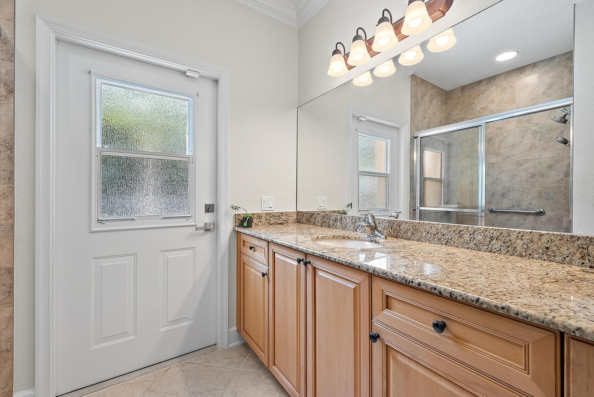 3065 Southeast Wake Road Port St. Lucie, FL 34984 - Photo 14 of 34 Ensuite bathroomcabana bath