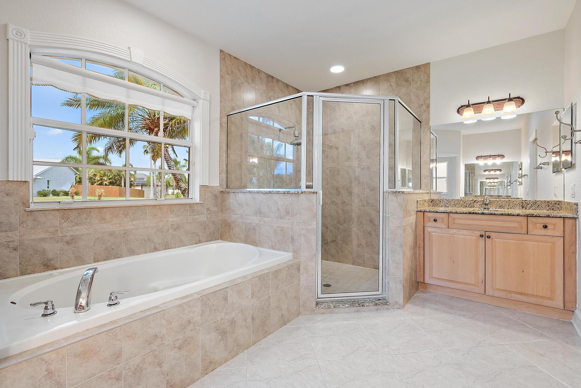 3065 Southeast Wake Road Port St. Lucie, FL 34984 - Photo 17 of 34 Primary Bathroom