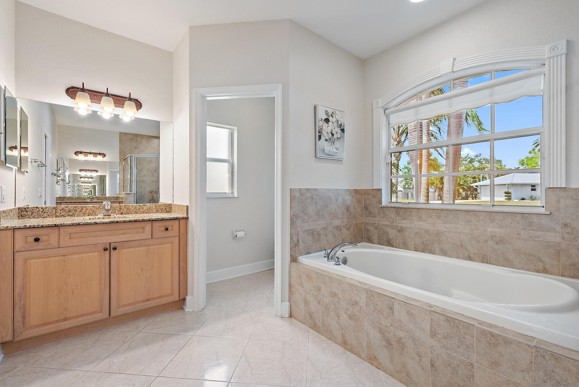 3065 Southeast Wake Road Port St. Lucie, FL 34984 - Photo 18 of 34 Primary Bathroom 2