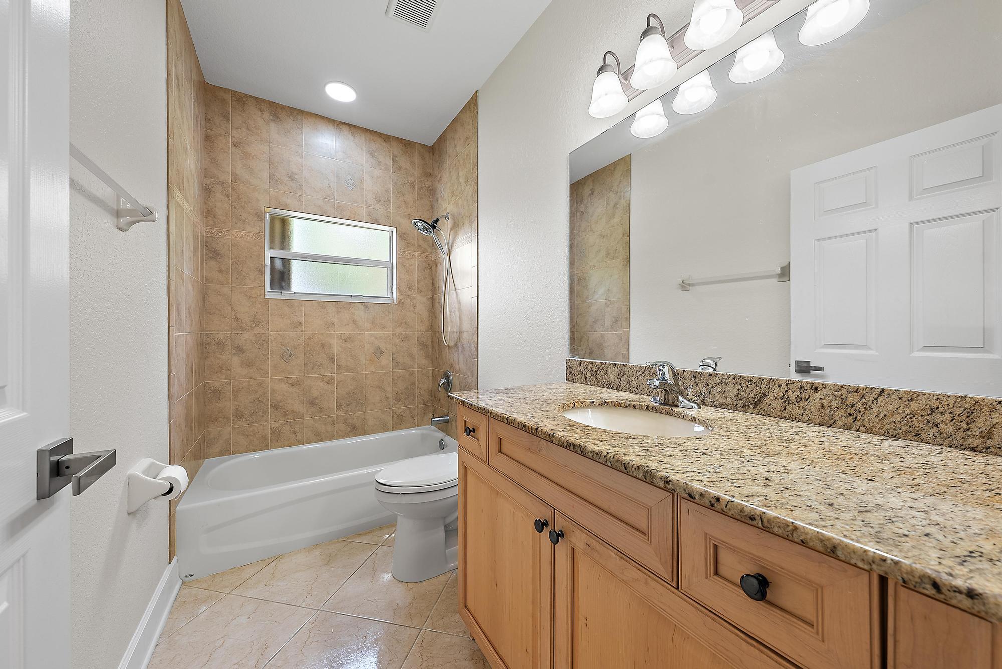 3065 Southeast Wake Road Port St. Lucie, FL 34984 - Photo 24 of 34 Bathroom 2