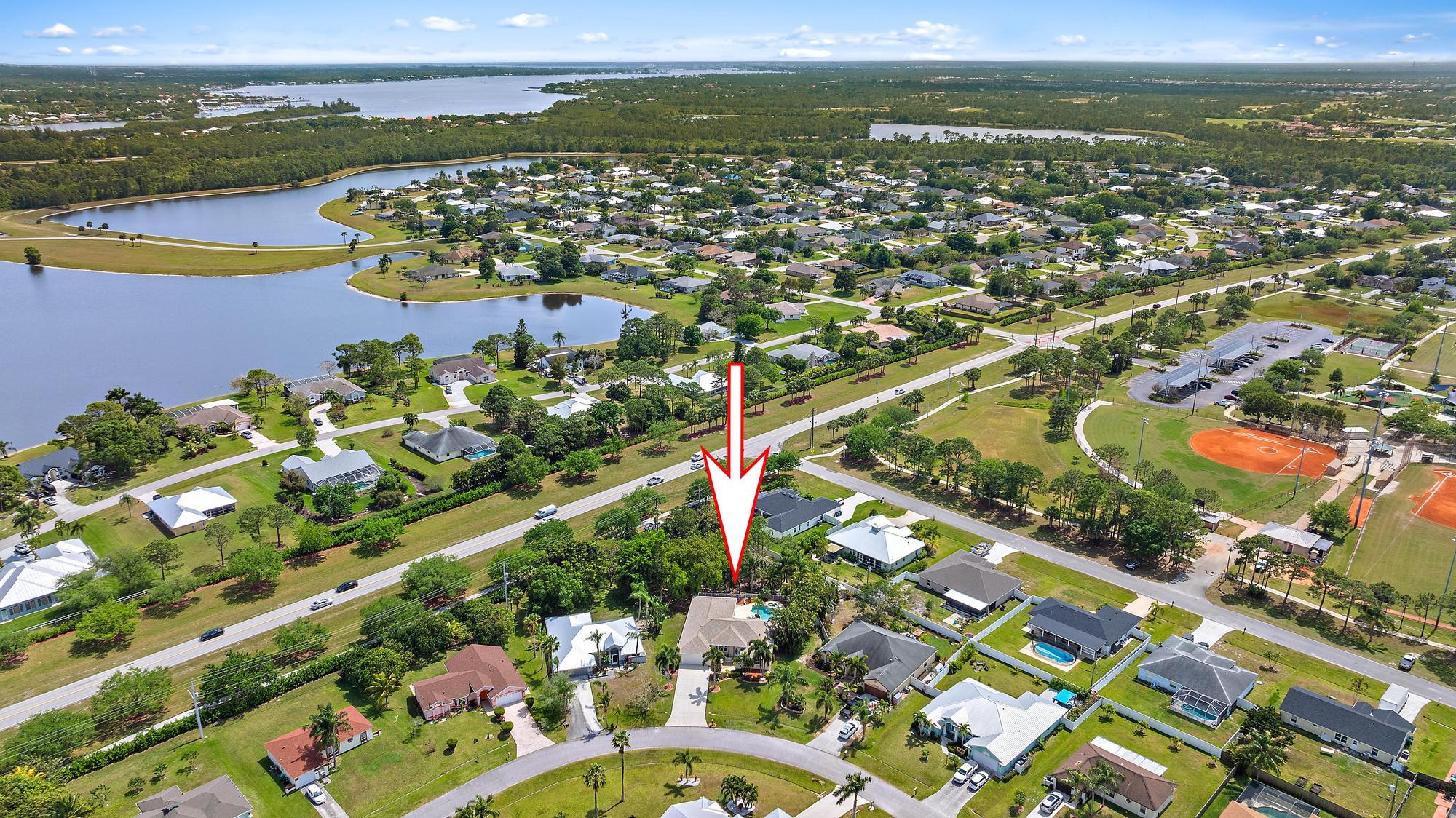 3065 Southeast Wake Road Port St. Lucie, FL 34984 - Photo 31 of 34 Aerial front of home with arrow yes