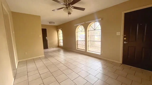 a view of an entryway with a chandelier