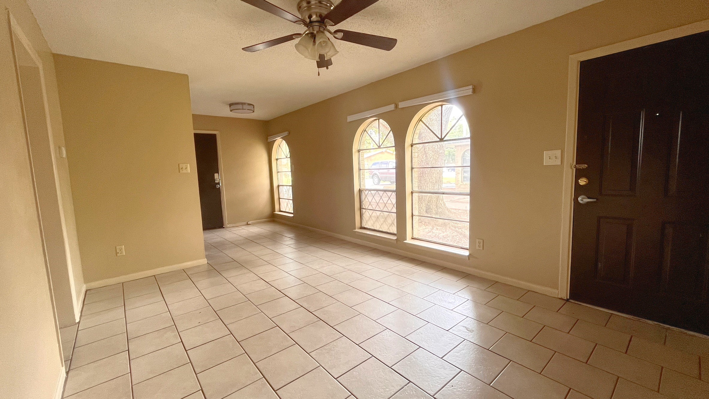 3021 Sycamore Avenue, Unit 1 Bay City, TX 77414 - Photo 3 of 9 a view of an entryway with a chandelier