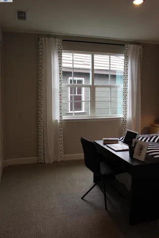 a view of a livingroom with furniture