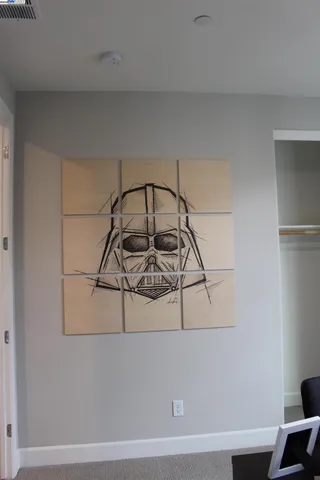 a living room with furniture a flat screen tv and a large window