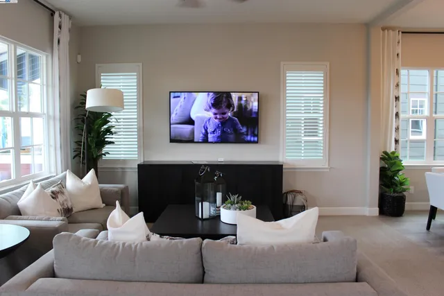 a kitchen with cabinets appliances and a sink