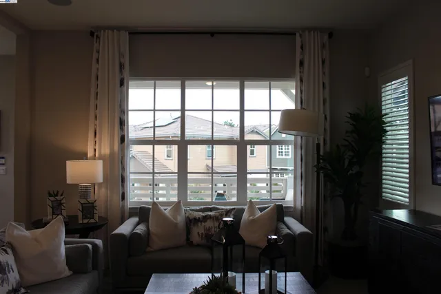 a kitchen with a stove and a refrigerator