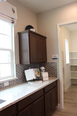 a view of a street with a building in the background