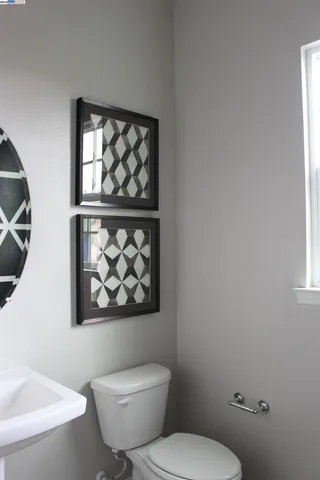 a front view of a residential apartment building with a yard