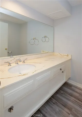 a view of a street with a tree