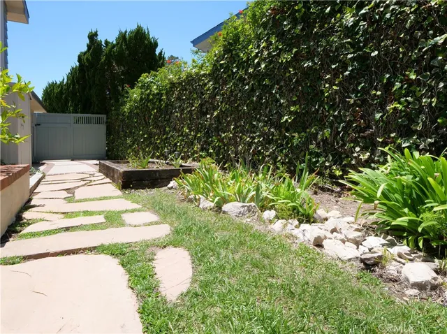 a view of a lake with a yard