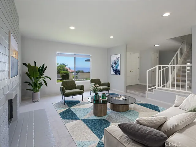 a living room with furniture and a couch