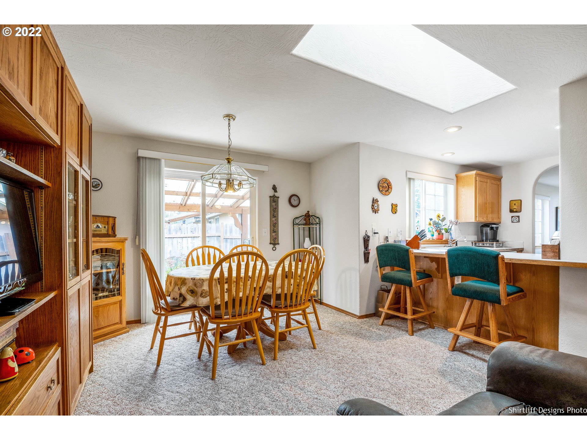 4042 Virginia Avenue Springfield, OR 97478 - Photo 11 of 28 a view of a dining room with furniture window and outside view