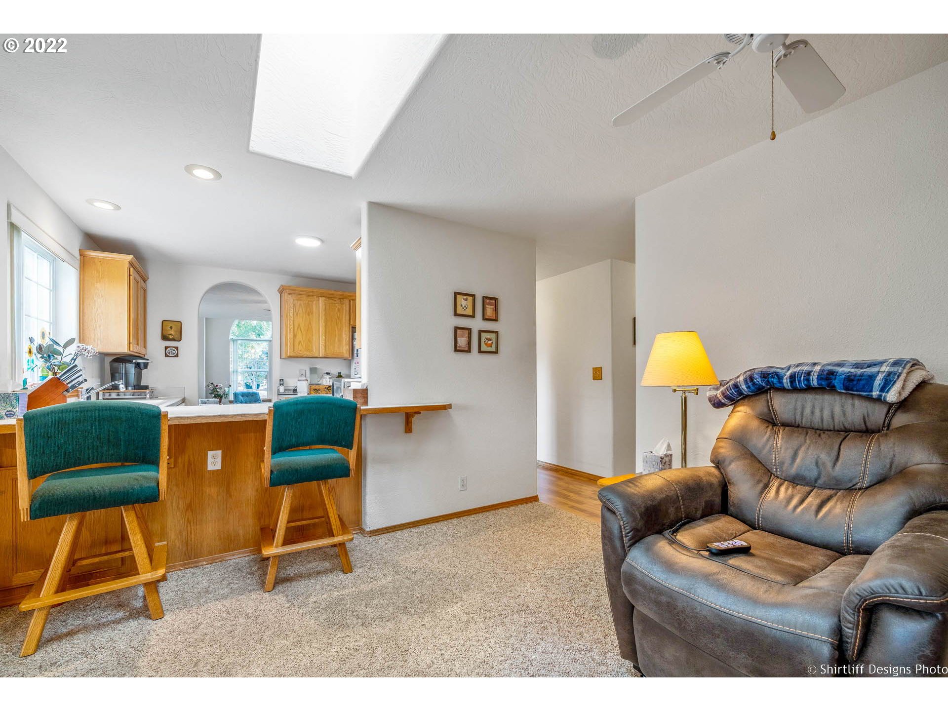 4042 Virginia Avenue Springfield, OR 97478 - Photo 12 of 28 a living room with furniture and a wooden floor
