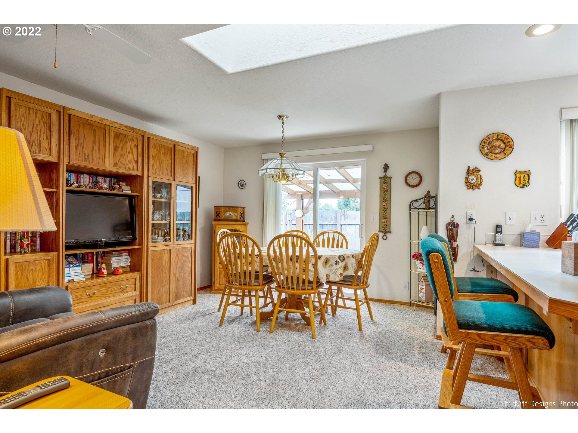 4042 Virginia Avenue Springfield, OR 97478 - Photo 10 of 28 a living room with furniture and a flat screen tv