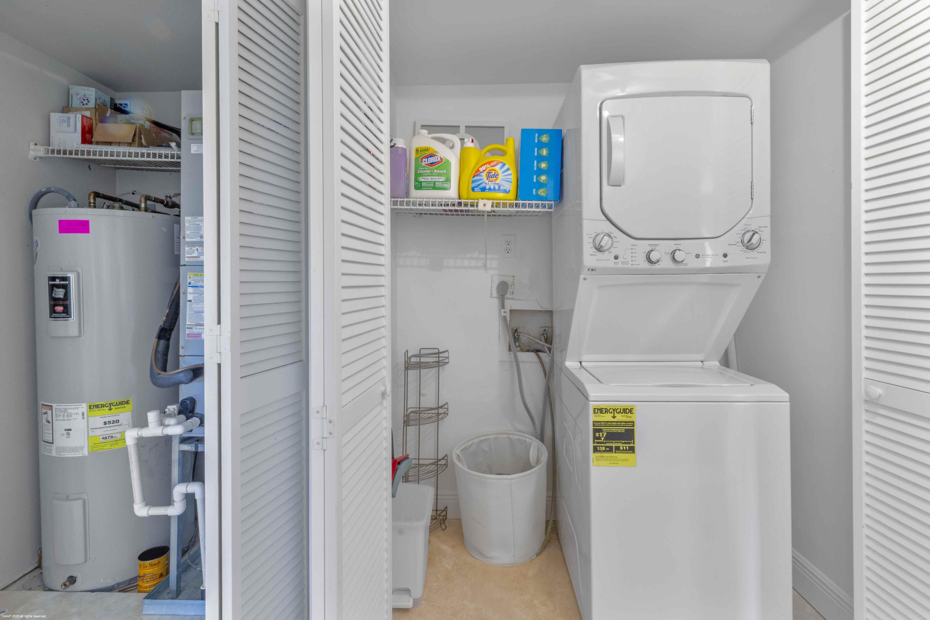 13329 Polo Club Road, Unit 105 Wellington, FL 33414 - Photo 31 of 43 a bathroom with a toilet and a shower curtain