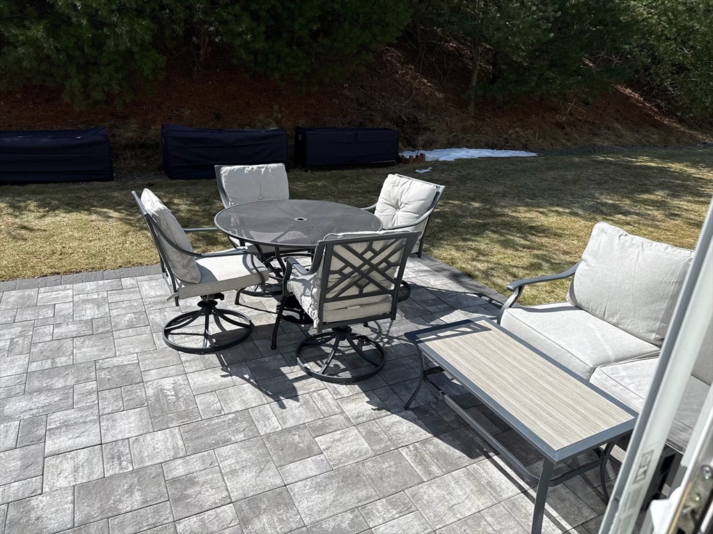 831 Ledgewood Way, Unit 831 Clinton, MA 01510 - Photo 37 of 41 a view of a outdoor sitting area with furniture