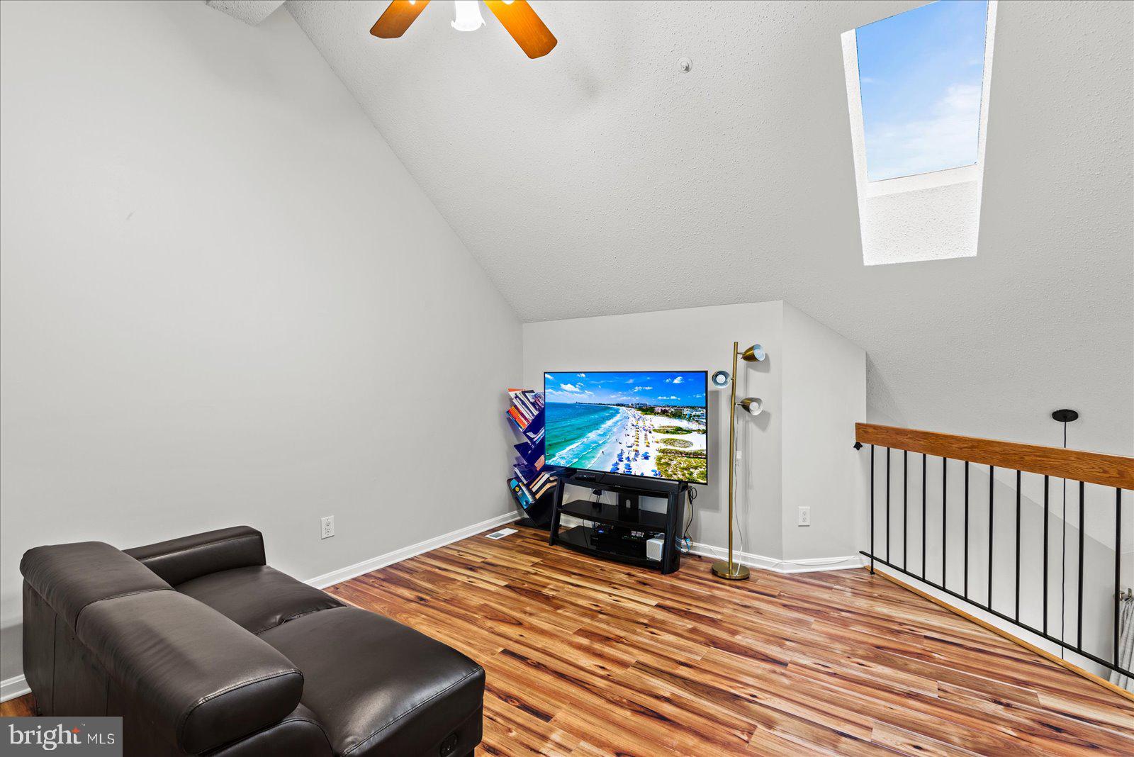 6000 F Mersey Oaks Way, Unit 1F Alexandria, VA 22315 - Photo 21 of 35 a bedroom with furniture and a window