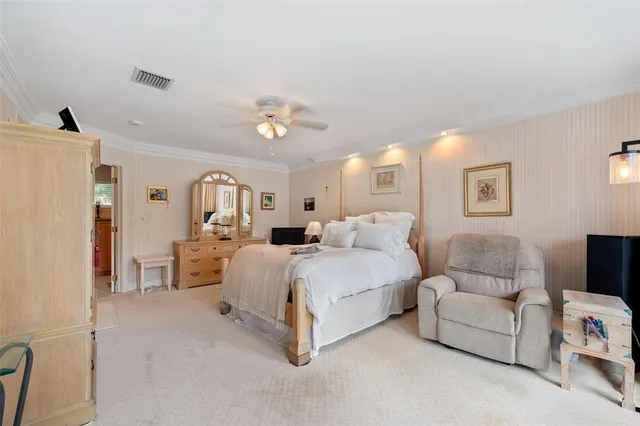 a view of a hallway with bathroom
