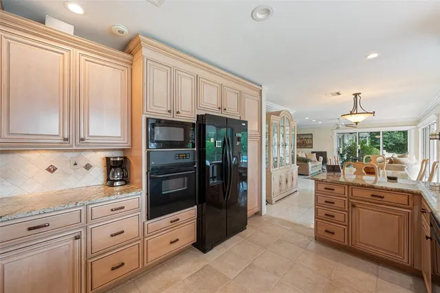 a kitchen with sink and window