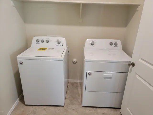 a front view of a house with garage