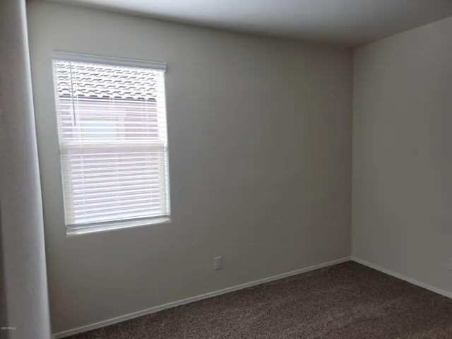 a front view of a house with yard