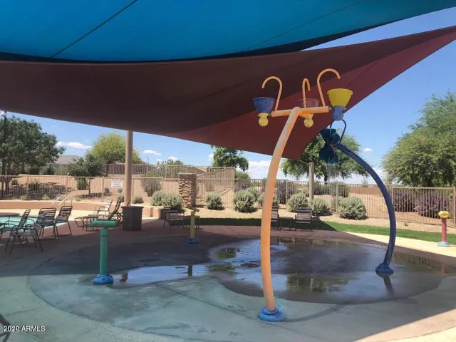 a street sign on a pole on a street