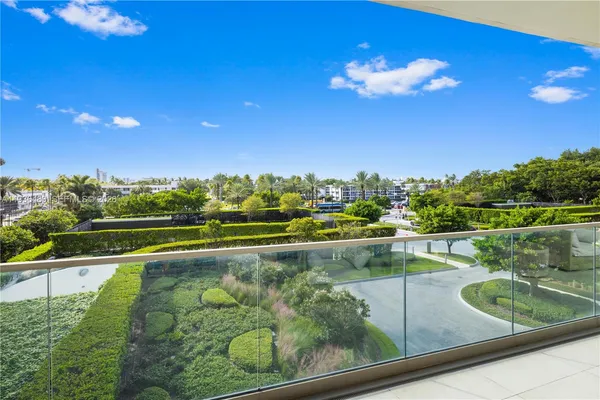 a view of a lake from a balcony