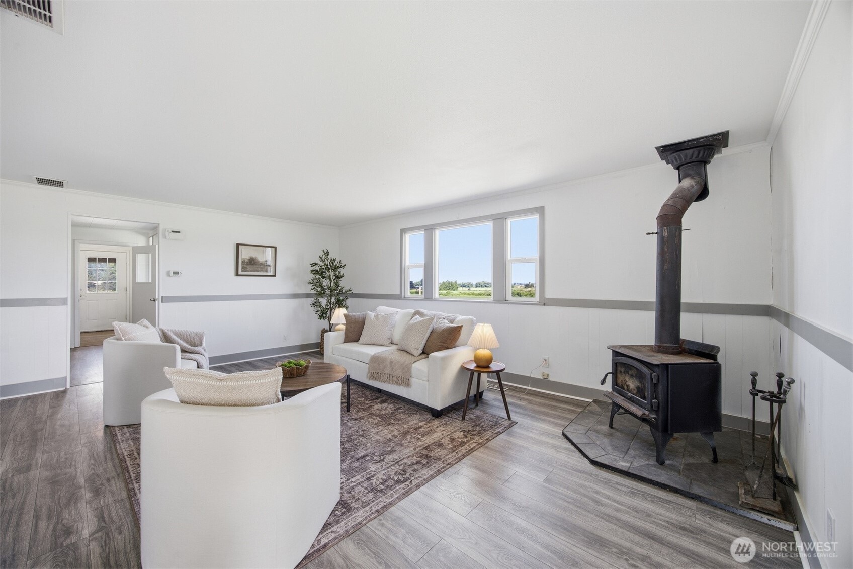 6791 Noon Road Everson, WA 98247 - Photo 5 of 38 a living room with furniture and a wooden floor