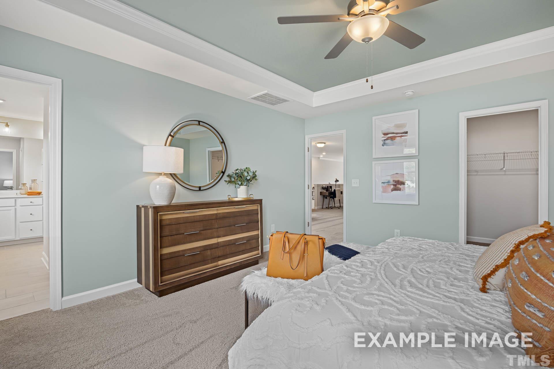 170 Rigsby Avenue Four Oaks, NC 27524 - Photo 29 of 39 a bedroom with a bed and a dresser