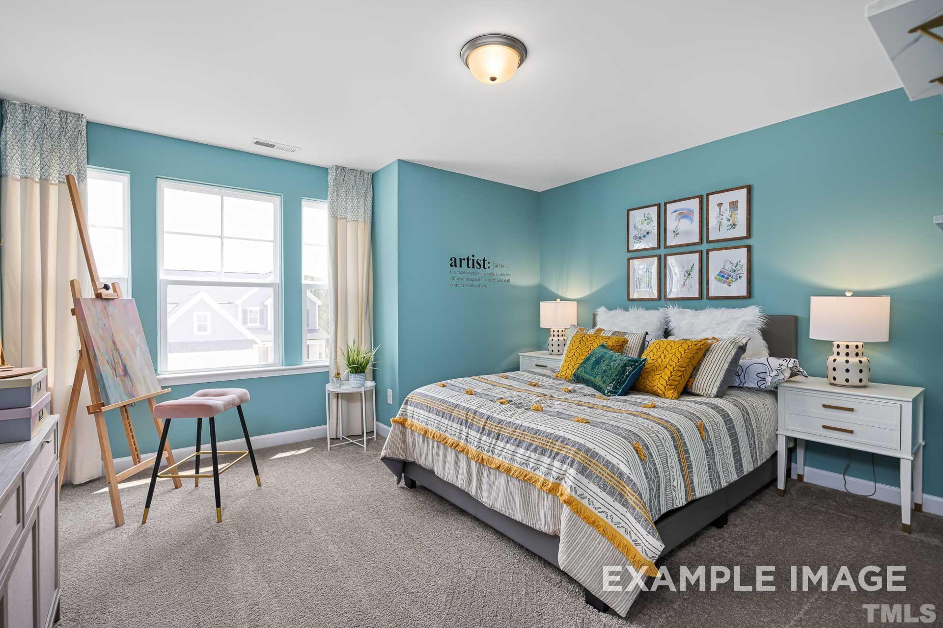 170 Rigsby Avenue Four Oaks, NC 27524 - Photo 30 of 39 a bedroom with a bed and window