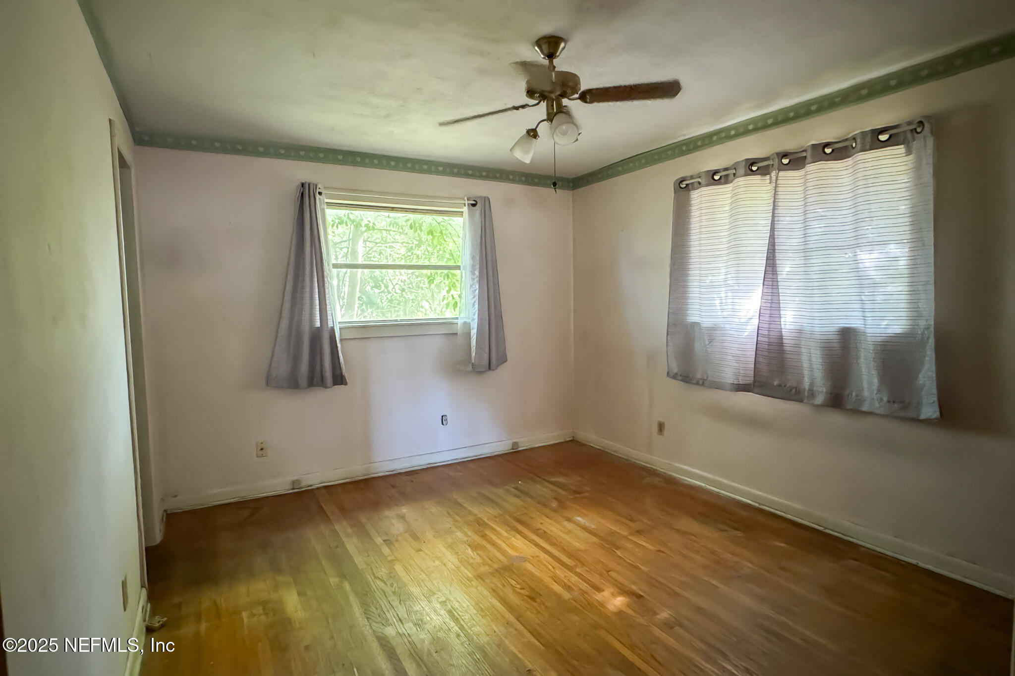 6537 Simca Drive Jacksonville, FL 32277 - Photo 13 of 26 a view of an empty room with a window