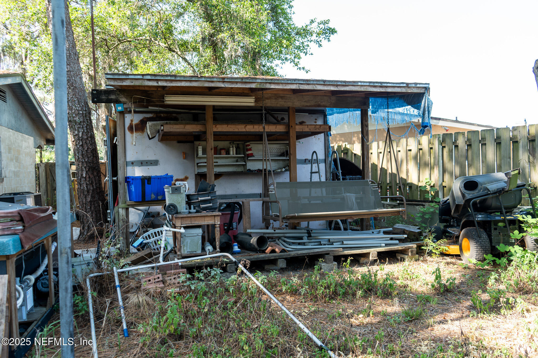 6537 Simca Drive Jacksonville, FL 32277 - Photo 21 of 26 a view of house with swimming pool