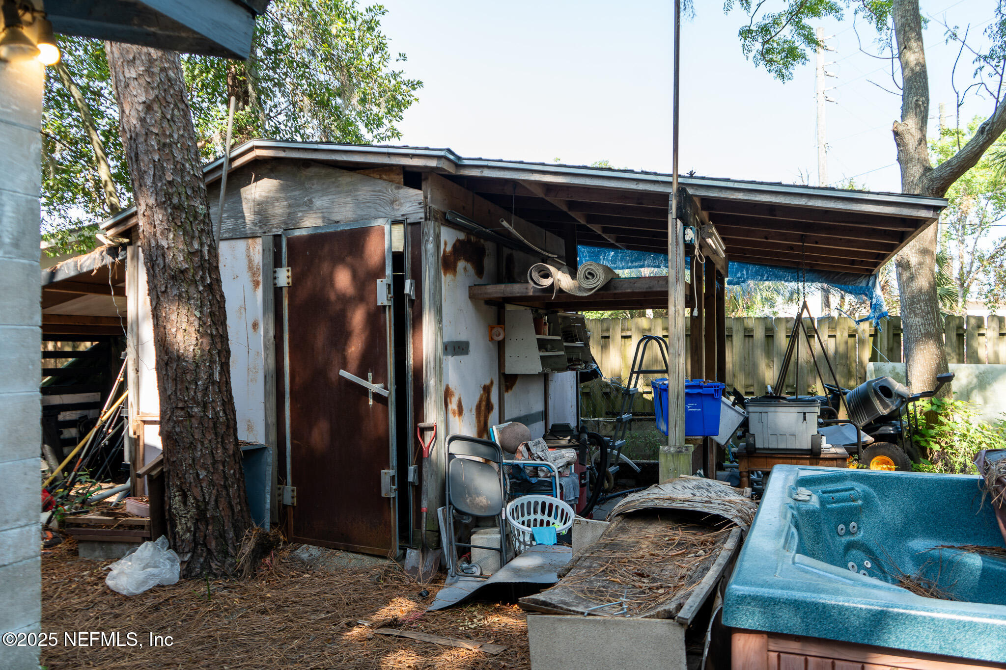 6537 Simca Drive Jacksonville, FL 32277 - Photo 24 of 26 a view of a chairs and table in the patio