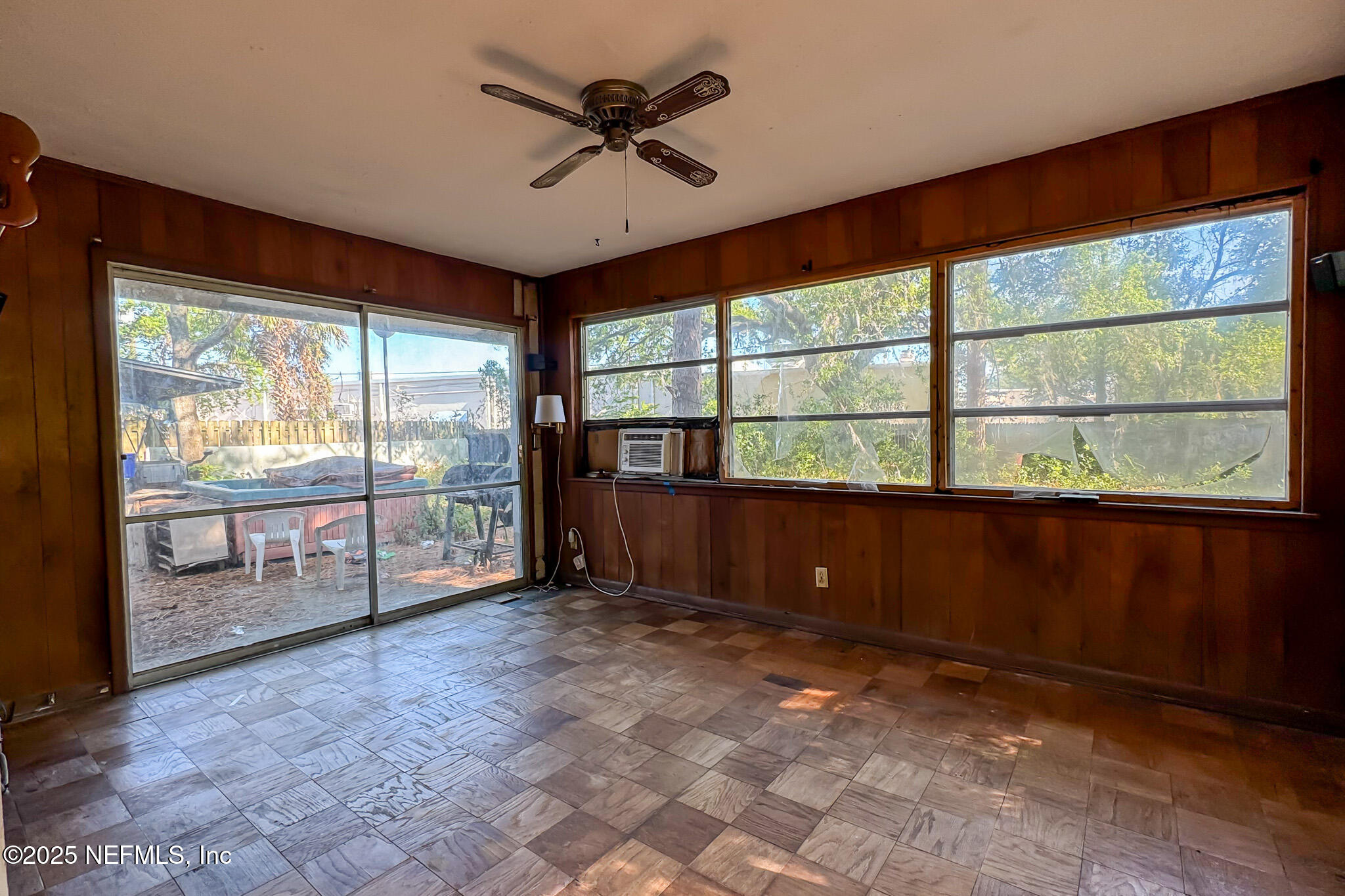 6537 Simca Drive Jacksonville, FL 32277 - Photo 9 of 26 a view of an empty room with a window