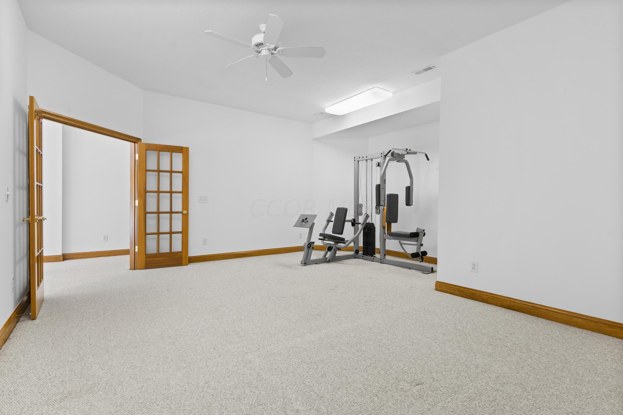 7722 Plumb Road Galena, OH 43021 - Photo 71 of 90 Lower-Level Workout/Media Room