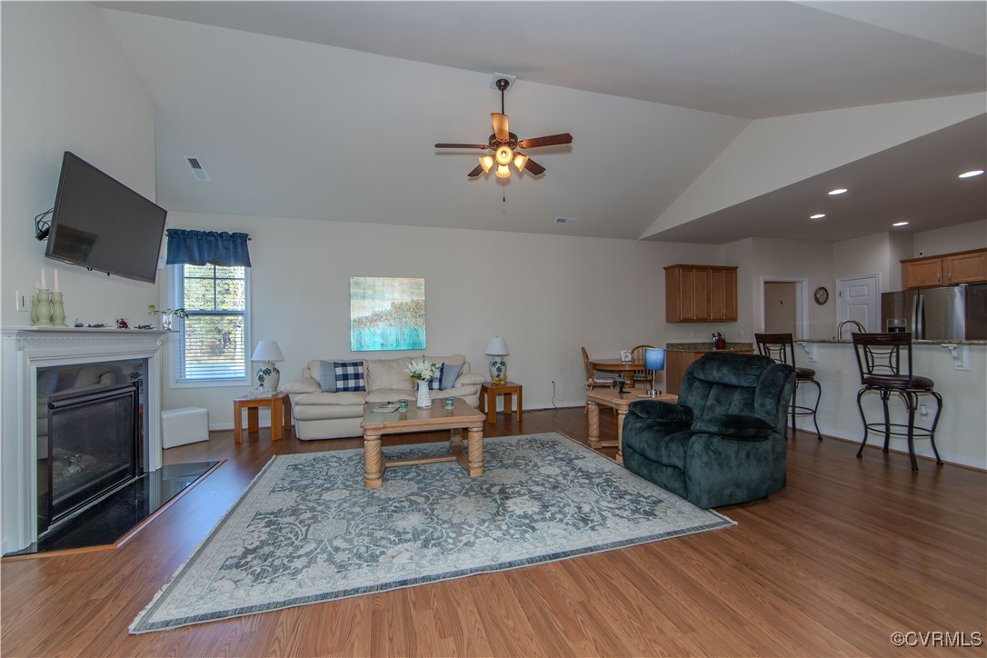12114 Blossom Point Road Chester, VA 23831 - Photo 2 of 15 Living room featuring dark hardwood / wood-style f