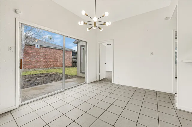 a kitchen with a stove and a microwave