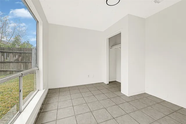 a view of front door and yard