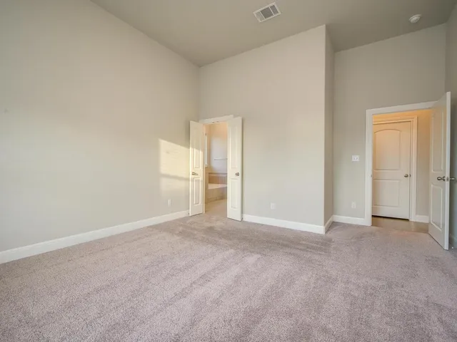 an empty room with an entryway