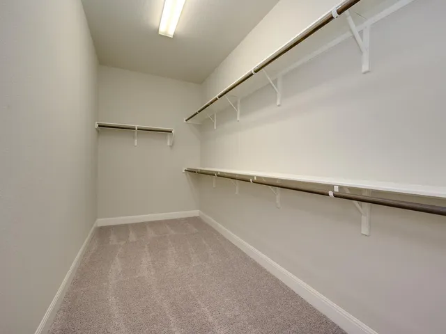 a view of a room with racks on the wall