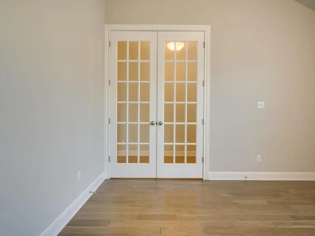 an empty room with windows