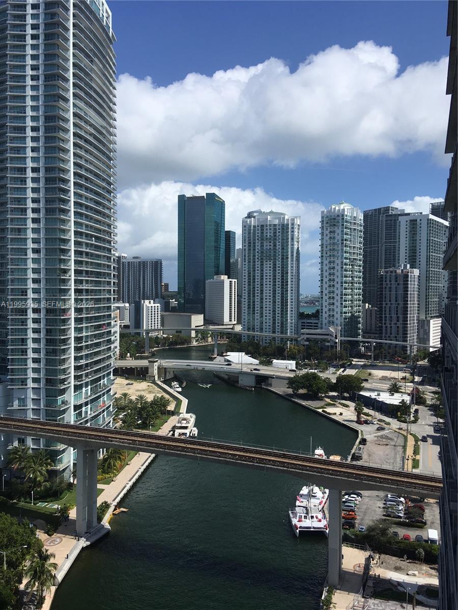 a view of a city with tall buildings
