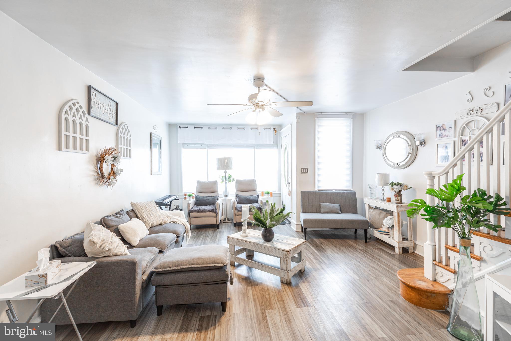578 Rosalie Street, Unit A Philadelphia, PA 19120 - Photo 3 of 14 a living room with furniture and a large window