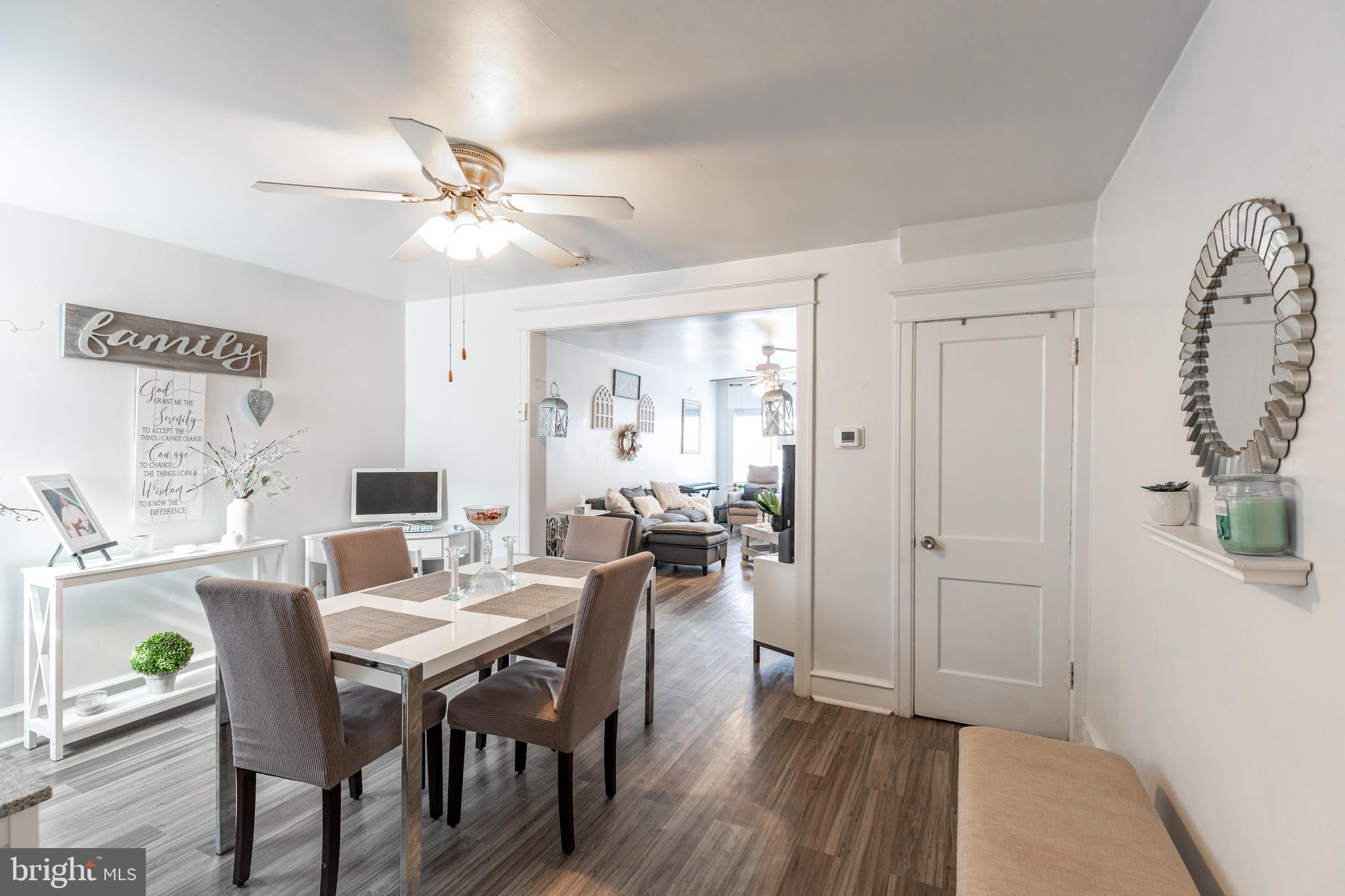 578 Rosalie Street, Unit A Philadelphia, PA 19120 - Photo 5 of 14 a view of a a dining room with furniture window and wooden floor
