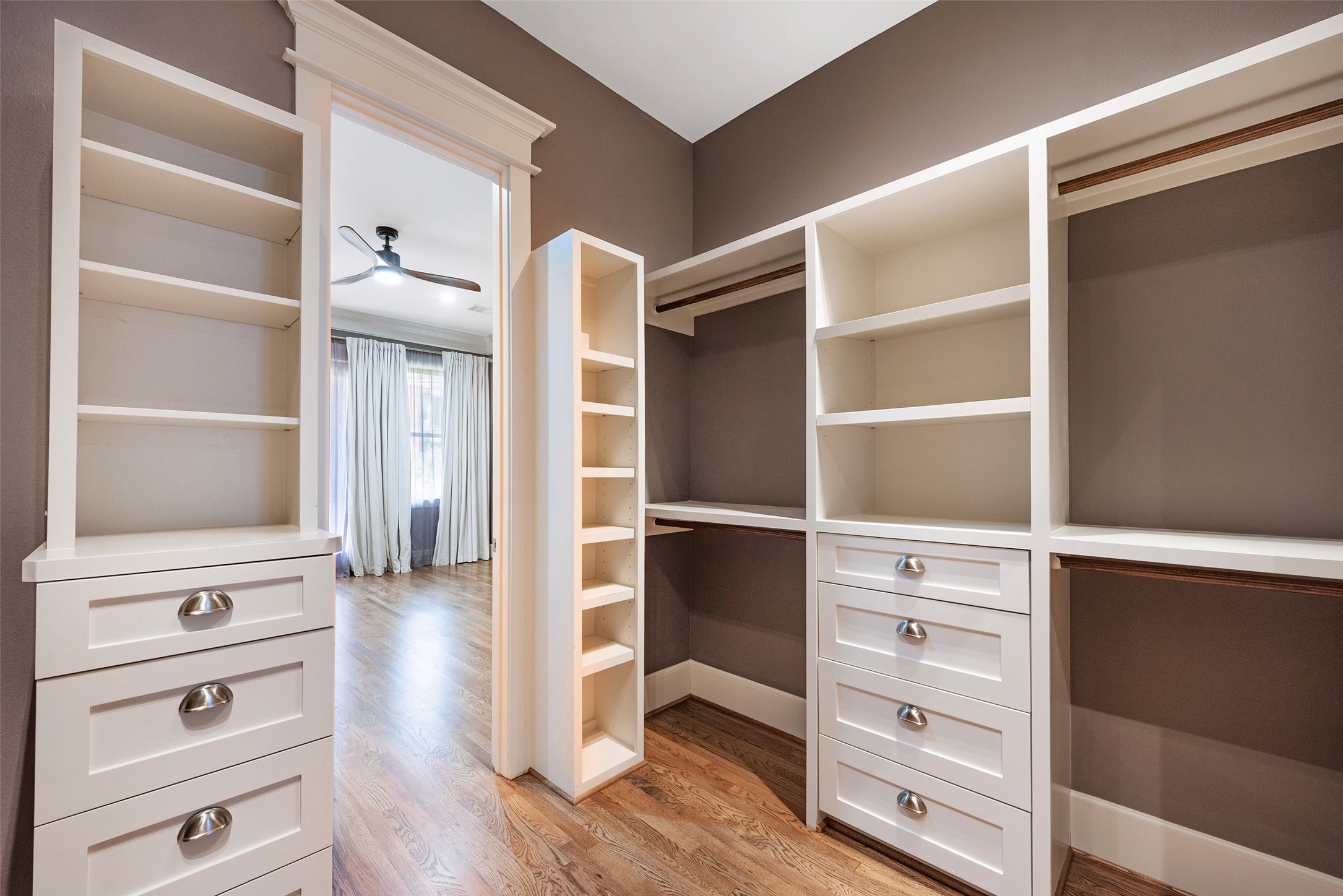 212 West 6th Street Houston, TX 77007 - Photo 17 of 45 a view of walk in closet with empty racks