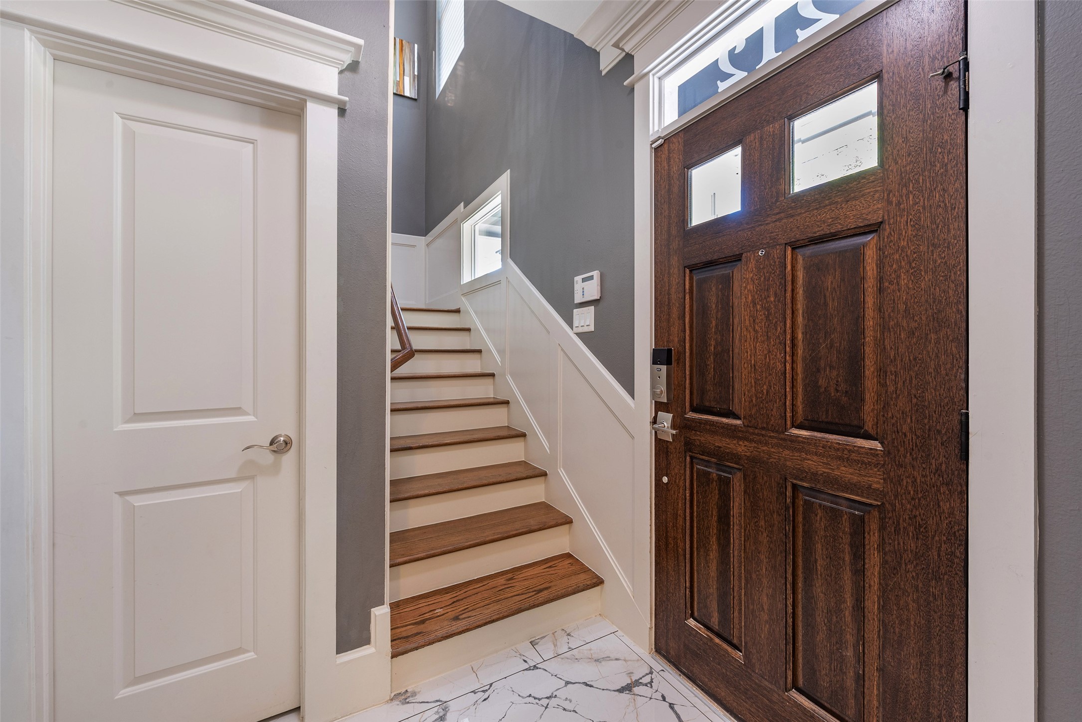 212 West 6th Street Houston, TX 77007 - Photo 2 of 45 a view of a entryway with staircase