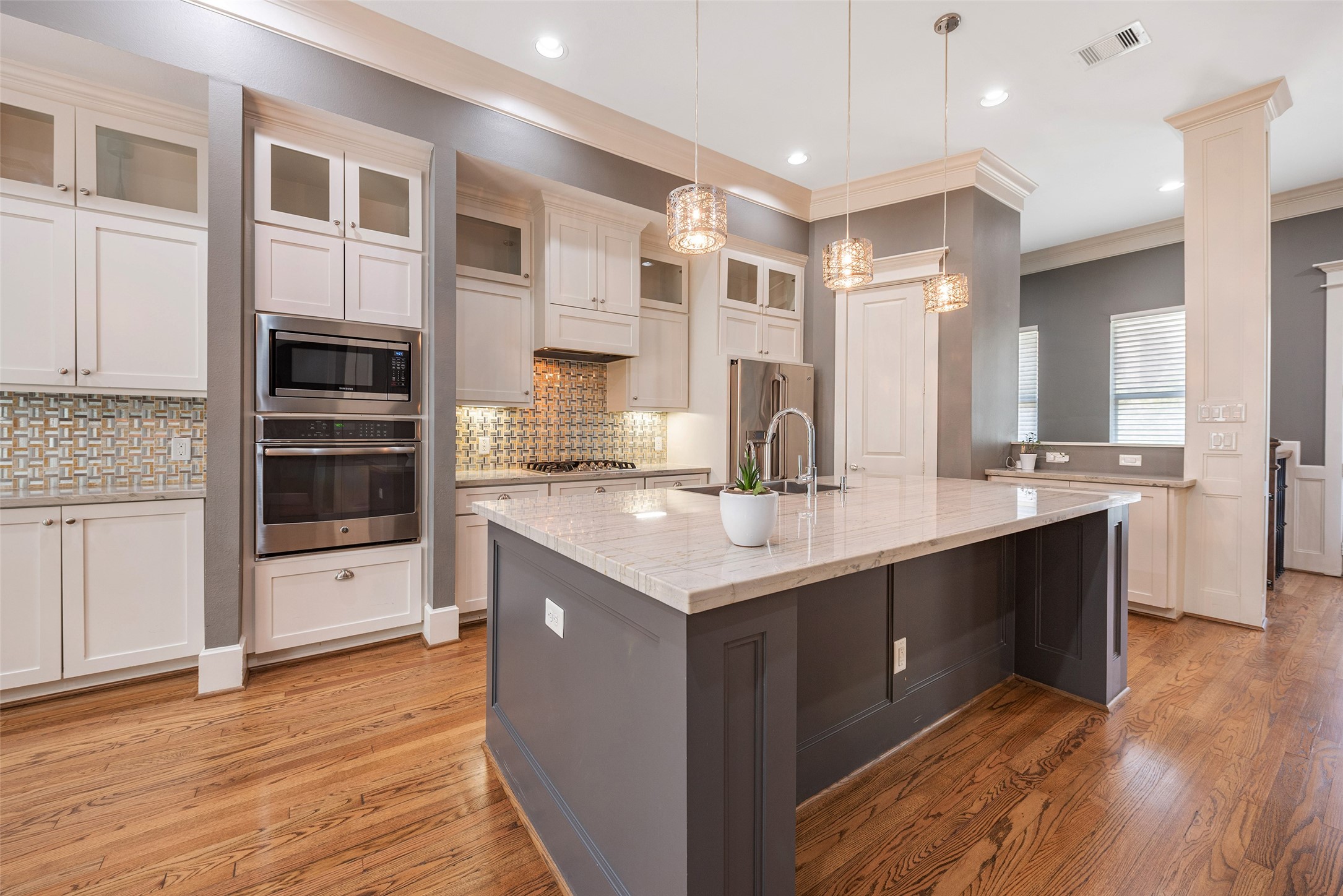 212 West 6th Street Houston, TX 77007 - Photo 6 of 45 a kitchen with stainless steel appliances granite countertop a stove and a sink