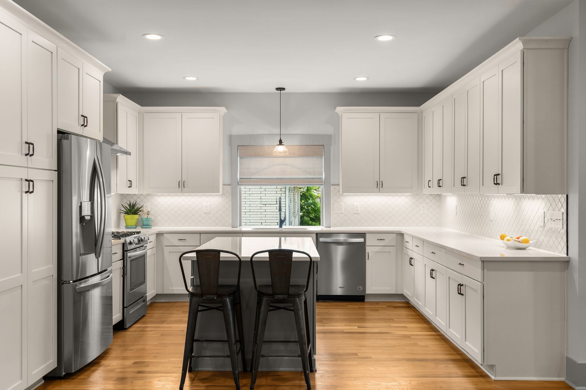 2660 Barclay Drive, Unit B Nashville, TN 37206 - Photo 11 of 29 a kitchen with a table chairs refrigerator a sink and cabinets