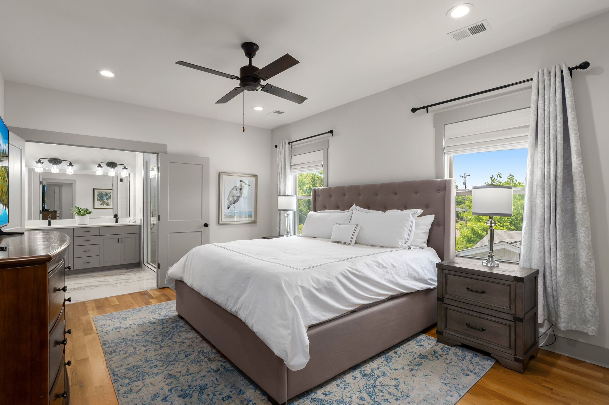 2660 Barclay Drive, Unit B Nashville, TN 37206 - Photo 18 of 29 a bedroom with a bed and a chandelier